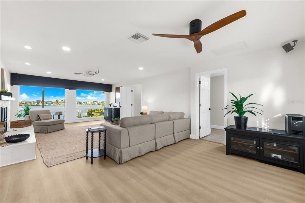 16895 1st Street East North Redington Beach, FL 33708 - Photo 37 of 96 a living room with furniture and a potted plant