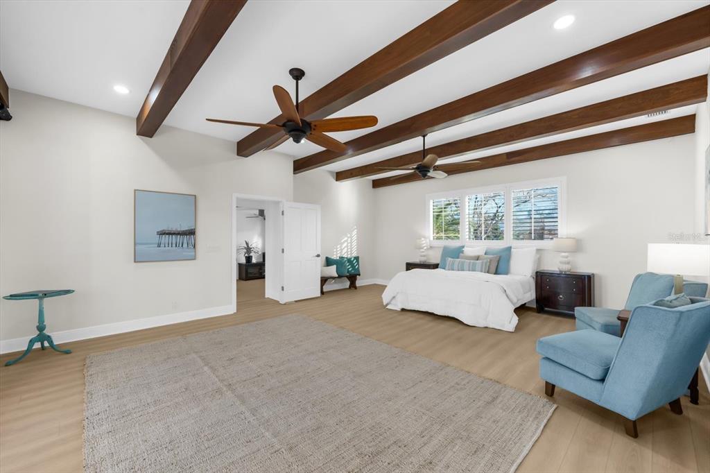 16895 1st Street East North Redington Beach, FL 33708 - Photo 40 of 96 a living room with furniture and a ceiling fan