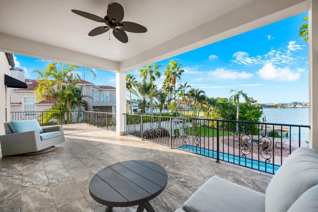 16895 1st Street East North Redington Beach, FL 33708 - Photo 43 of 97 a view of a porch with furniture