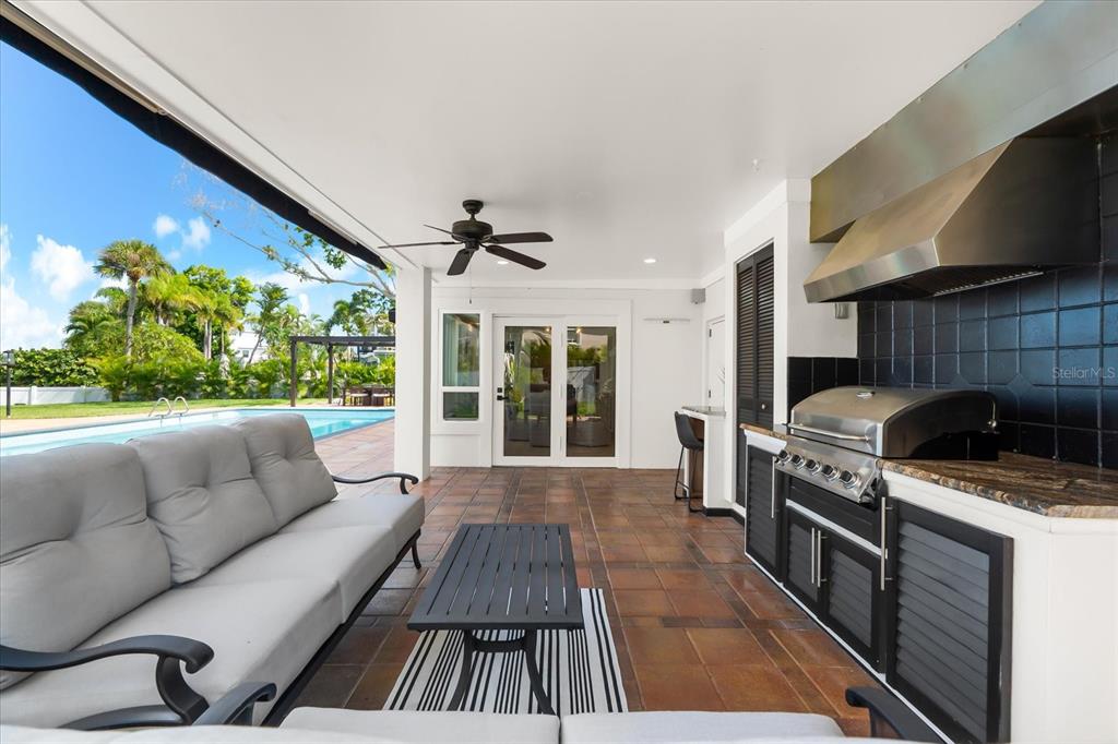 16895 1st Street East North Redington Beach, FL 33708 - Photo 61 of 97 a living room with furniture and a fireplace