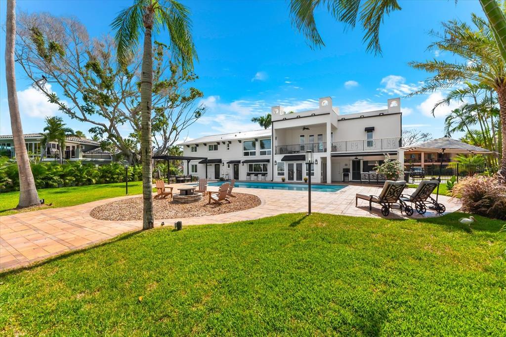 16895 1st Street East North Redington Beach, FL 33708 - Photo 67 of 97 a view of a house with a yard and sitting area