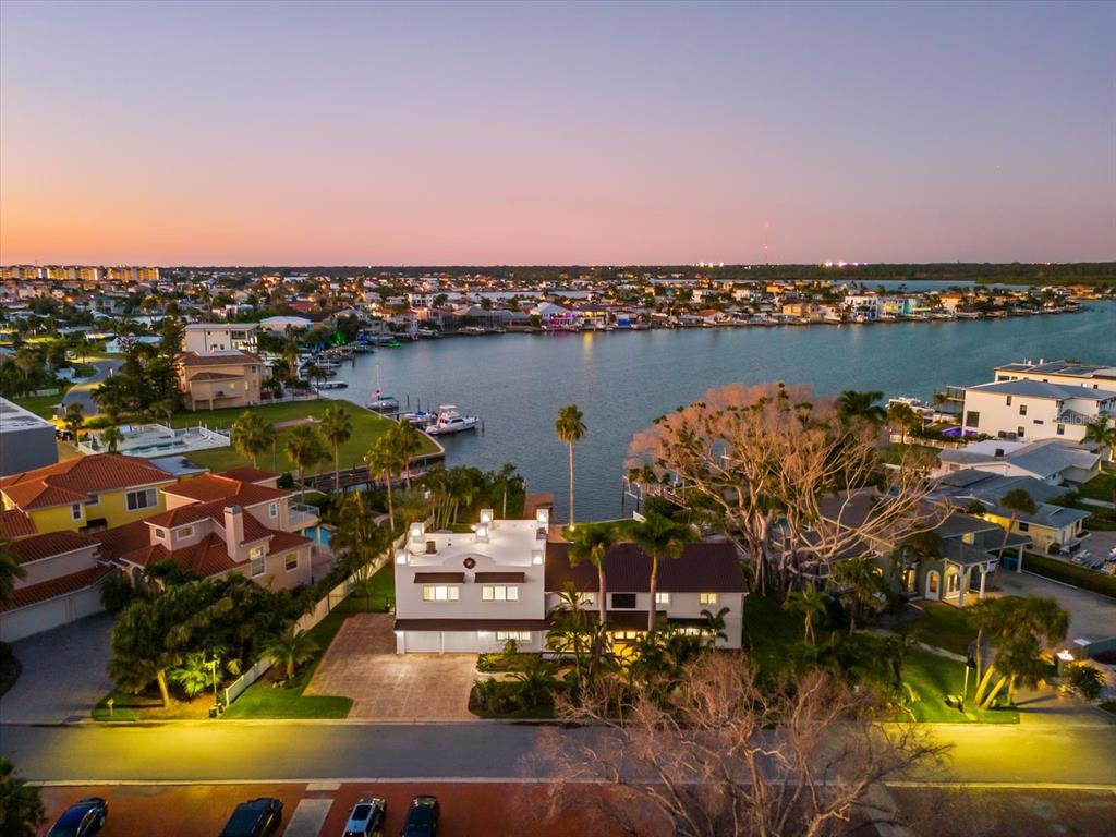 16895 1st Street East North Redington Beach, FL 33708 - Photo 81 of 97 an aerial view of a houses with a lake view
