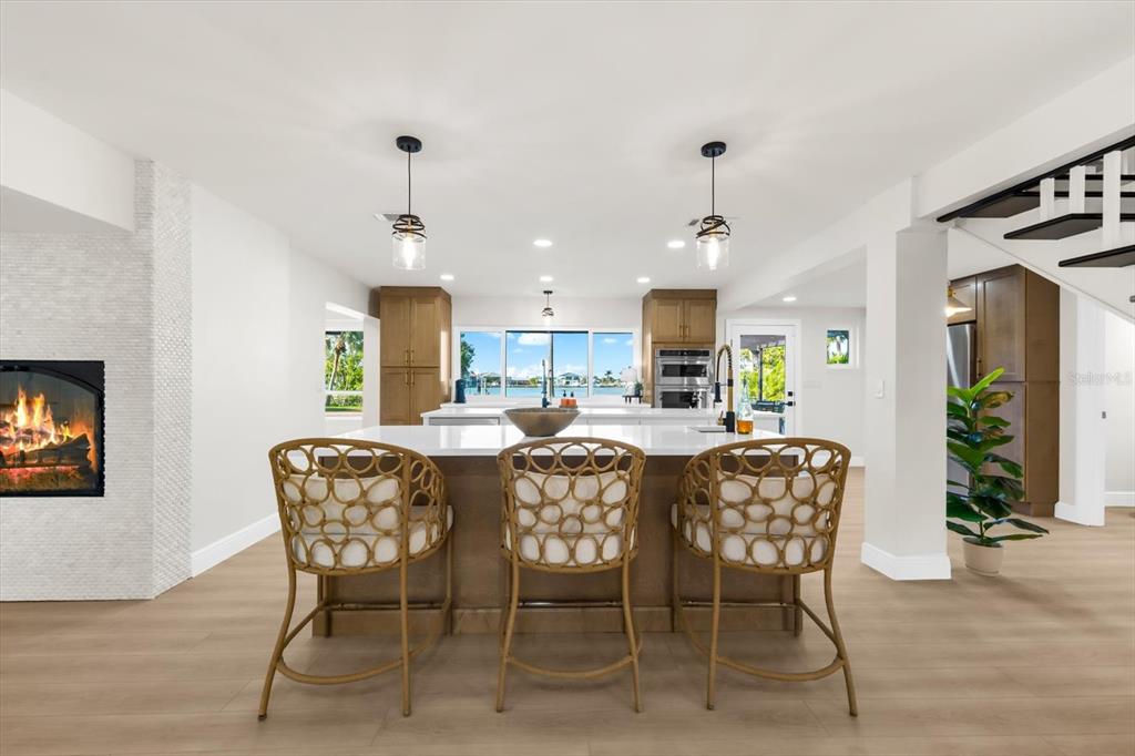 16895 1st Street East North Redington Beach, FL 33708 - Photo 9 of 96 a dining room with furniture window and wooden floor