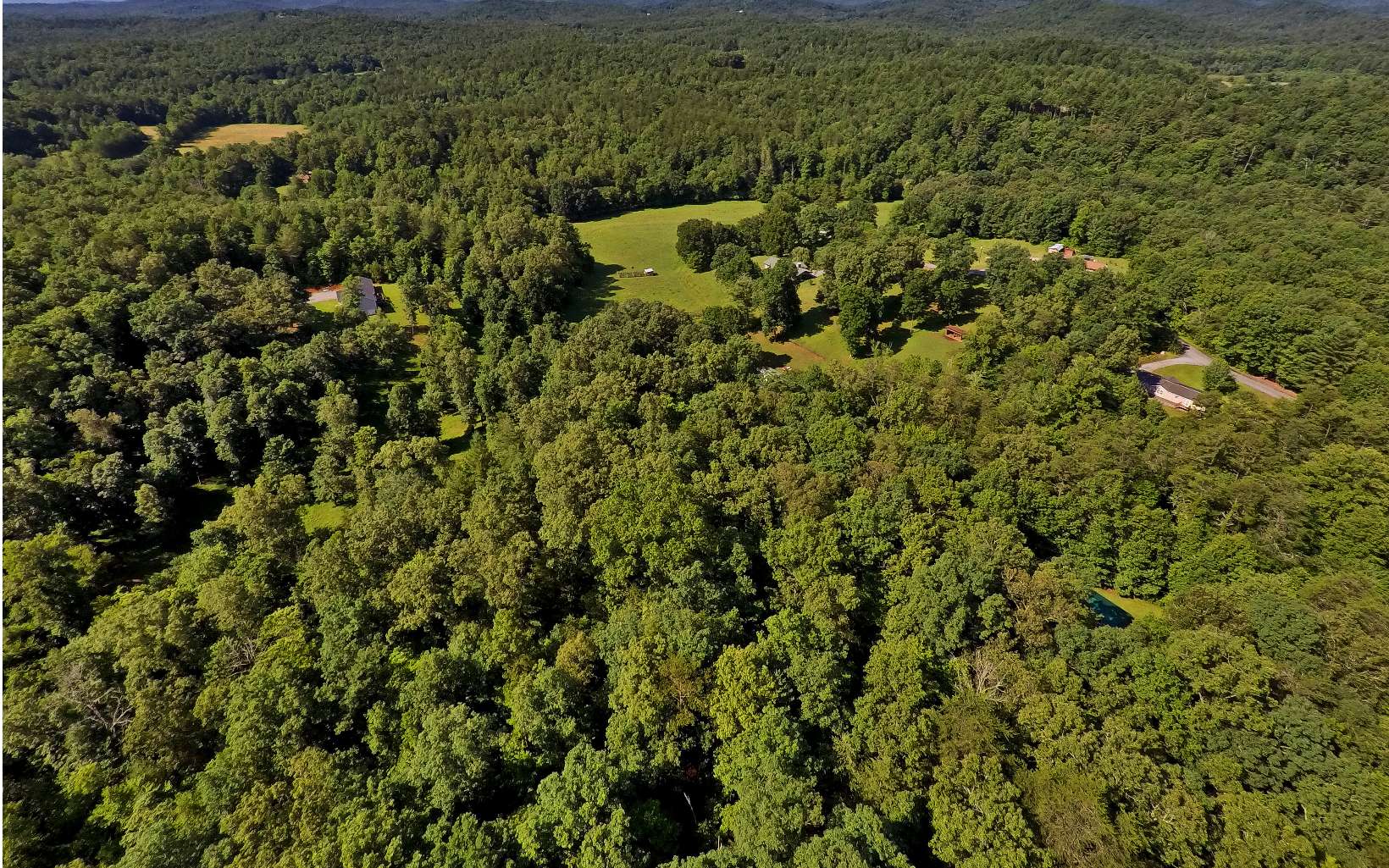 5.06 Queen Road Epworth, GA 30541 - Photo 1 of 1 an aerial view of residential house with outdoor space