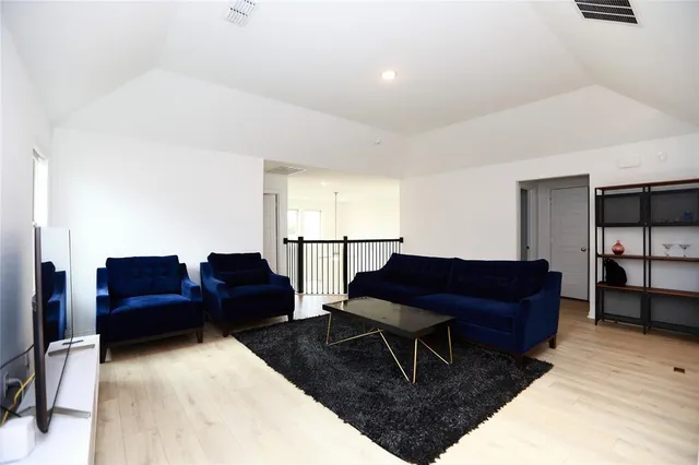 a living room with furniture and a couch