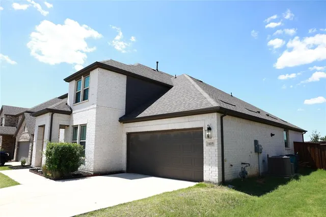 a front view of house with yard
