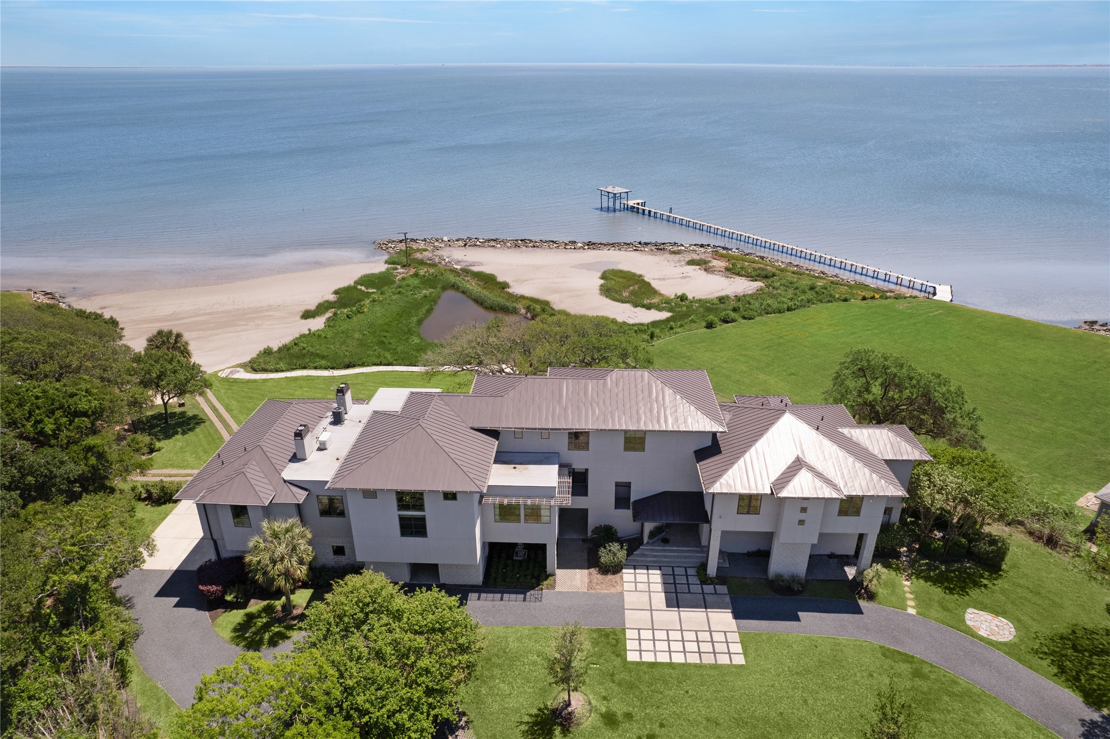 633 Quintana Roo Place Seabrook, TX 77586 - Photo 1 of 47 Only 30 minutes from downtown Houston, this gorgeous, Bayfront estate offers every amenity.