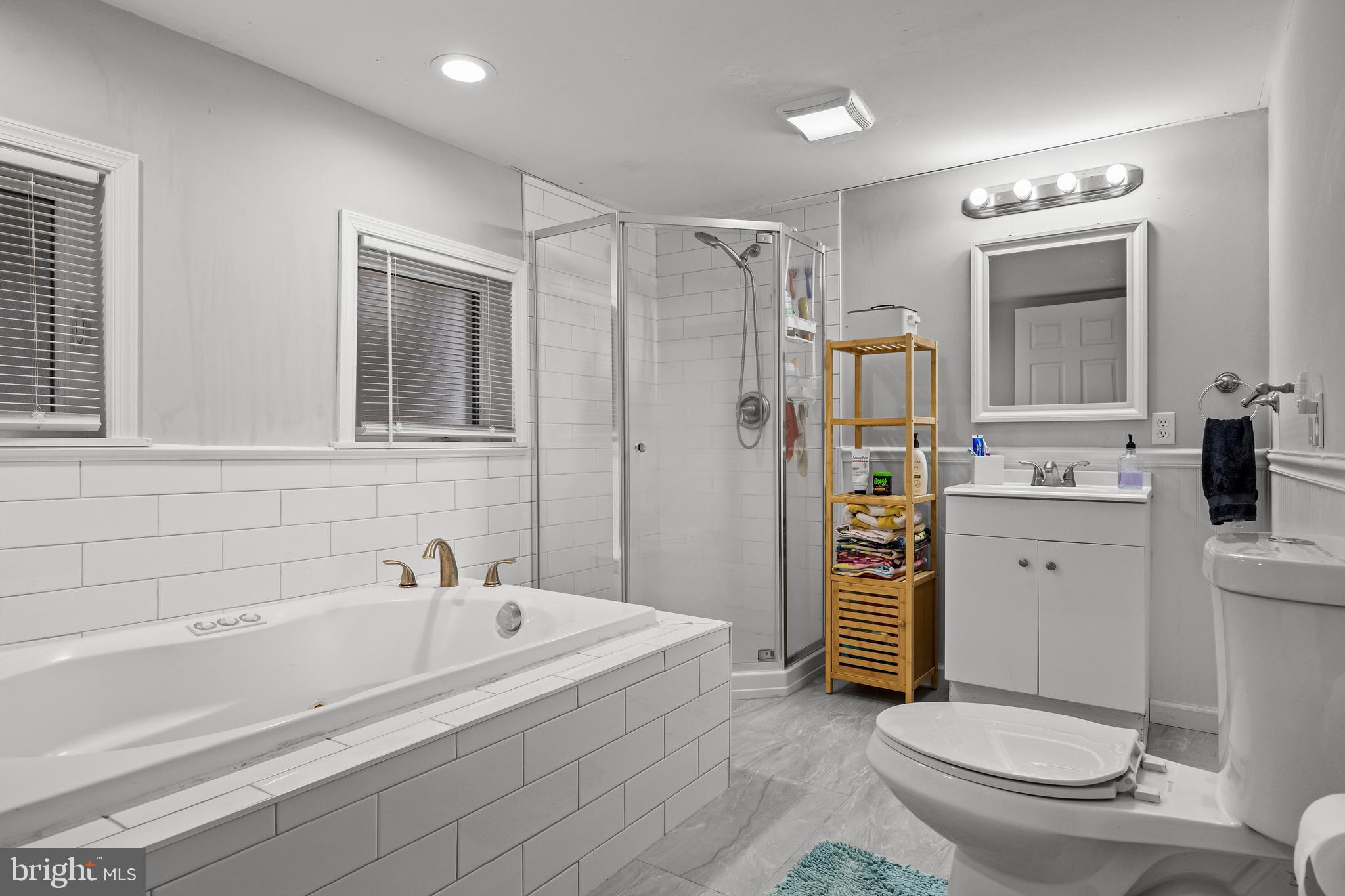 450 South 1st Road Hammonton, NJ 08037 - Photo 21 of 28 a spacious bathroom with a sink a toilet and shower