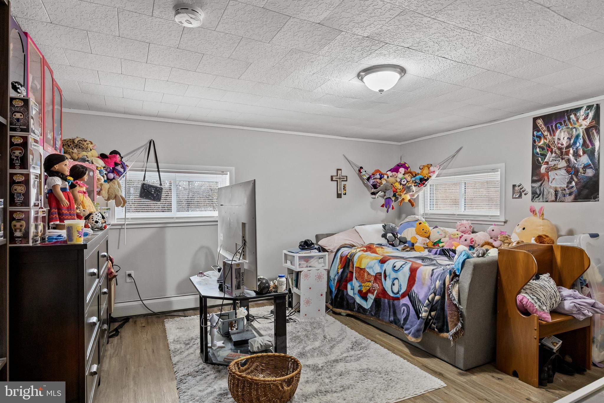 450 South 1st Road Hammonton, NJ 08037 - Photo 22 of 28 a bedroom with furniture and a bed