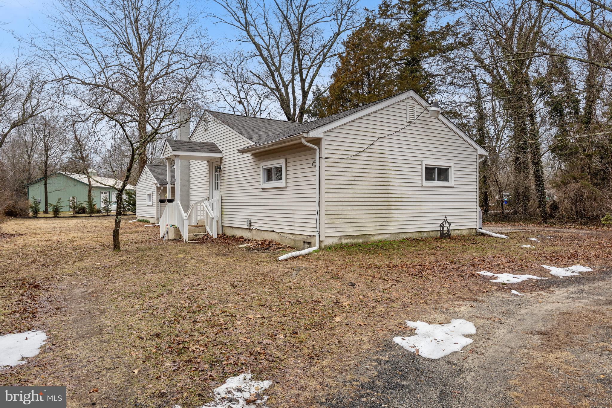 450 South 1st Road Hammonton, NJ 08037 - Photo 24 of 28 a view of a white house with a yard