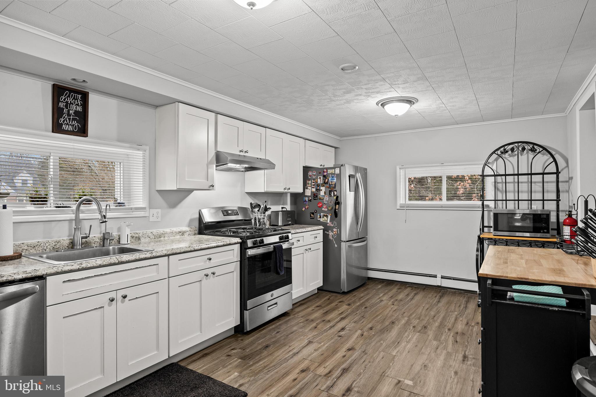 450 South 1st Road Hammonton, NJ 08037 - Photo 4 of 28 a kitchen with a sink appliances and cabinets