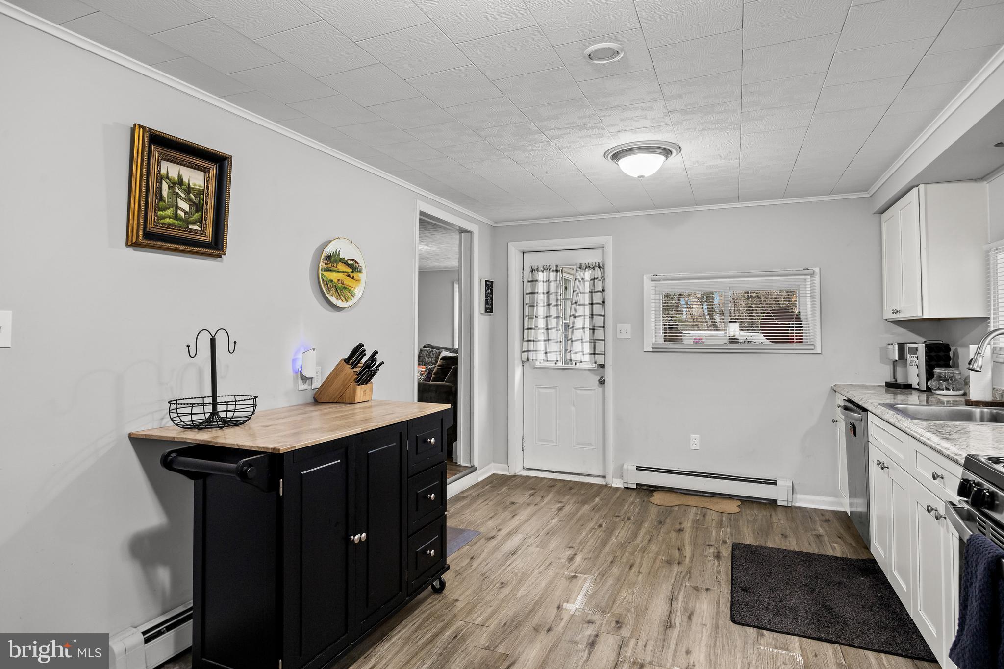 450 South 1st Road Hammonton, NJ 08037 - Photo 7 of 28 a view of a workspace with furniture and wooden floor