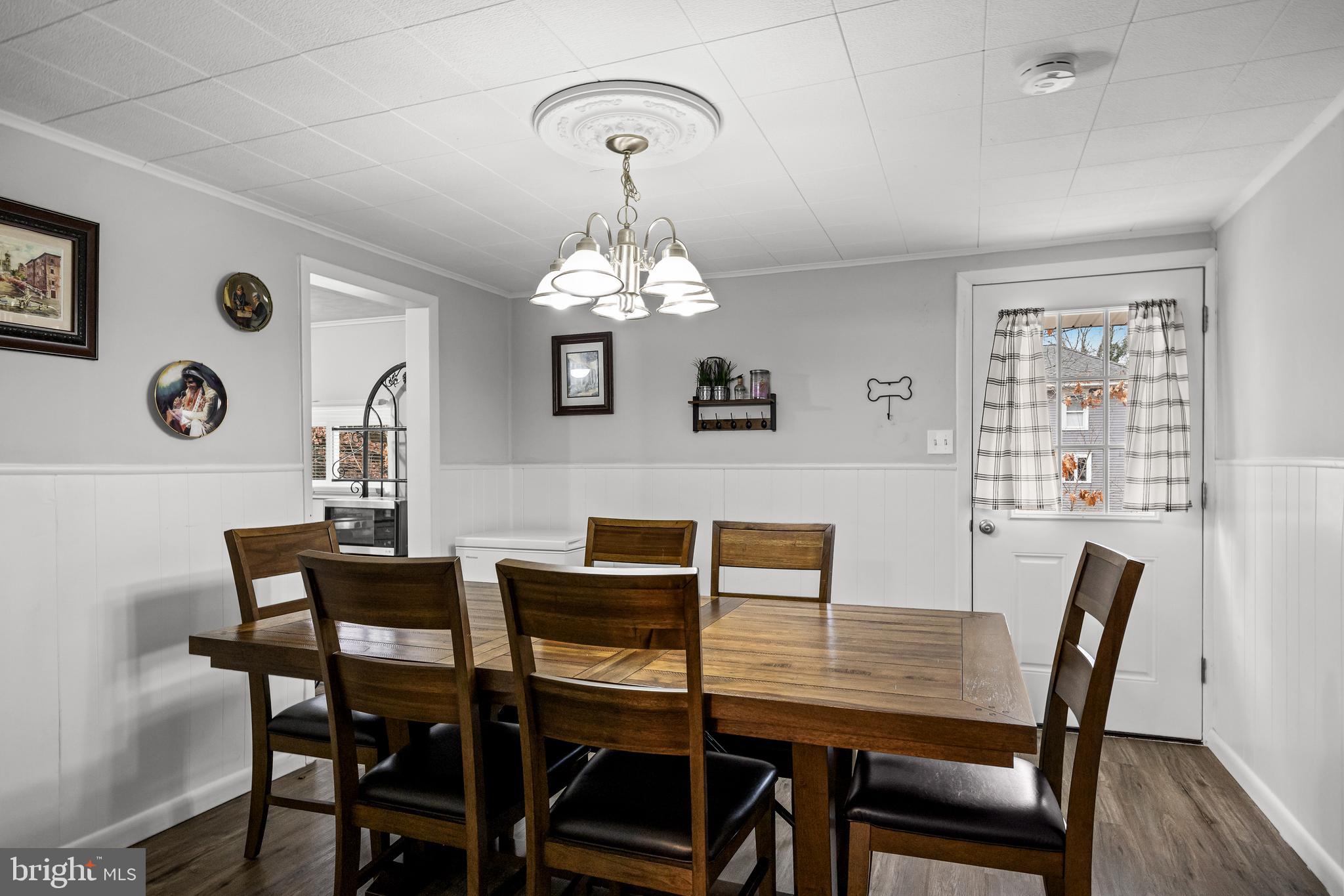 450 South 1st Road Hammonton, NJ 08037 - Photo 9 of 28 a view of a dining room with furniture and wooden floor
