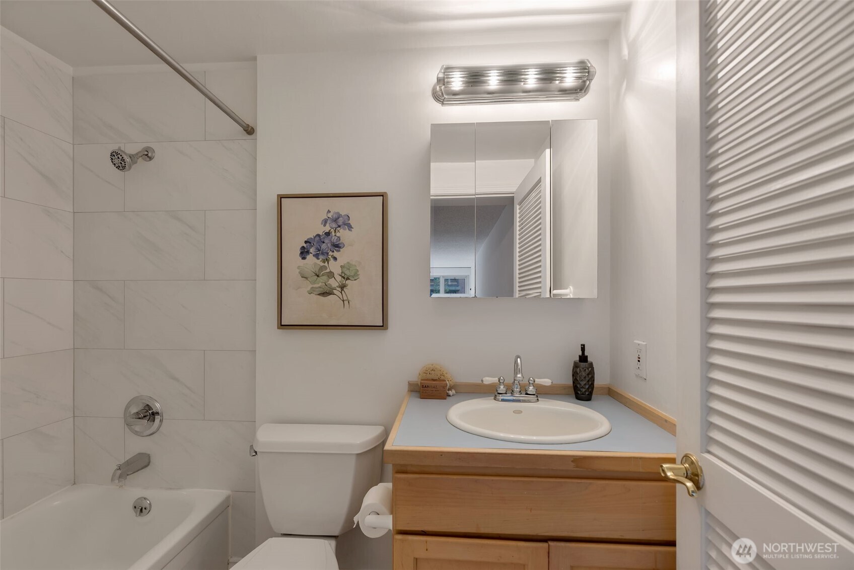 1000 Union Street, Unit 110 Seattle, WA 98101 - Photo 16 of 16 a bathroom with a sink toilet and a bathtub