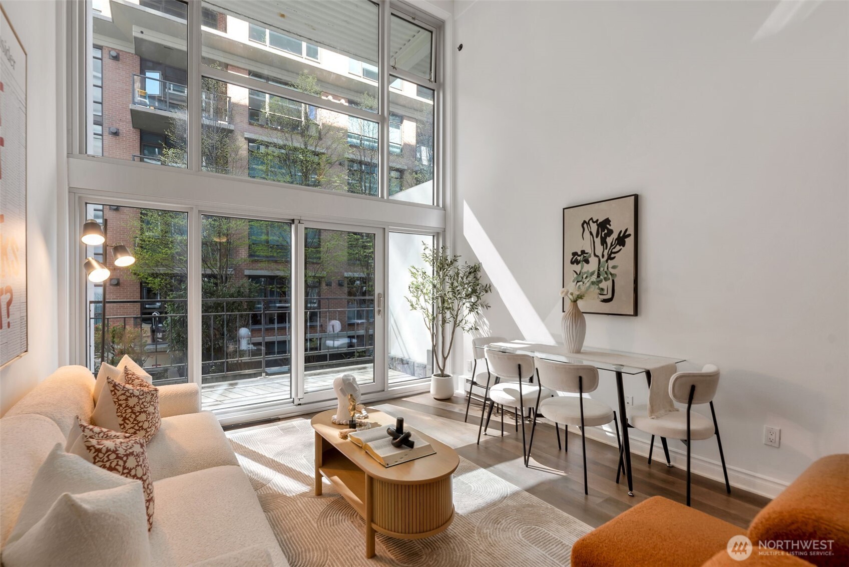1000 Union Street, Unit 110 Seattle, WA 98101 - Photo 8 of 16 a living room with furniture and a large window