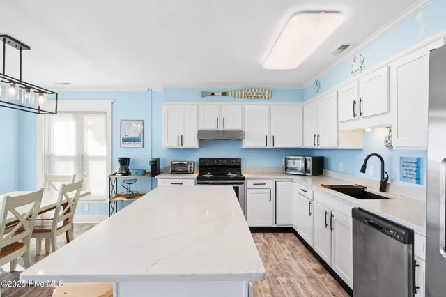 $1,549,000 | 599 Ocean Boulevard West, Holden Beach, NC 28462