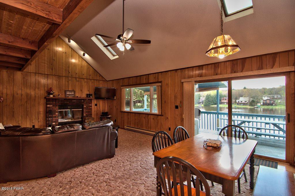 2327 Brookfield Road Lake Ariel, PA 18436 - Photo 7 of 53 a dining room with furniture a chandelier and window