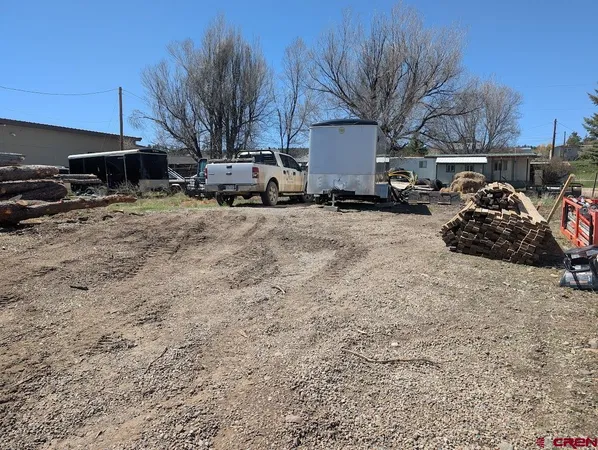 a view of a backyard of a house