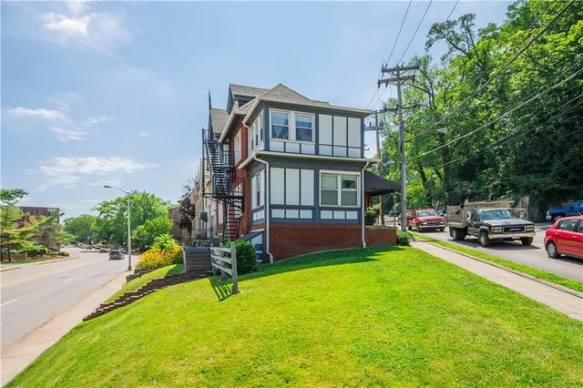 a view of a street sign on a building
