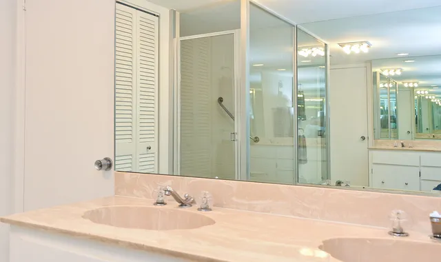 a bathroom with a bathtub and a sink