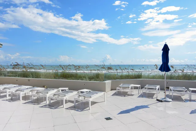 a view of a lake with a terrace