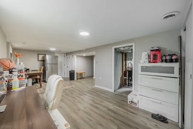 a view of a living room and entryway
