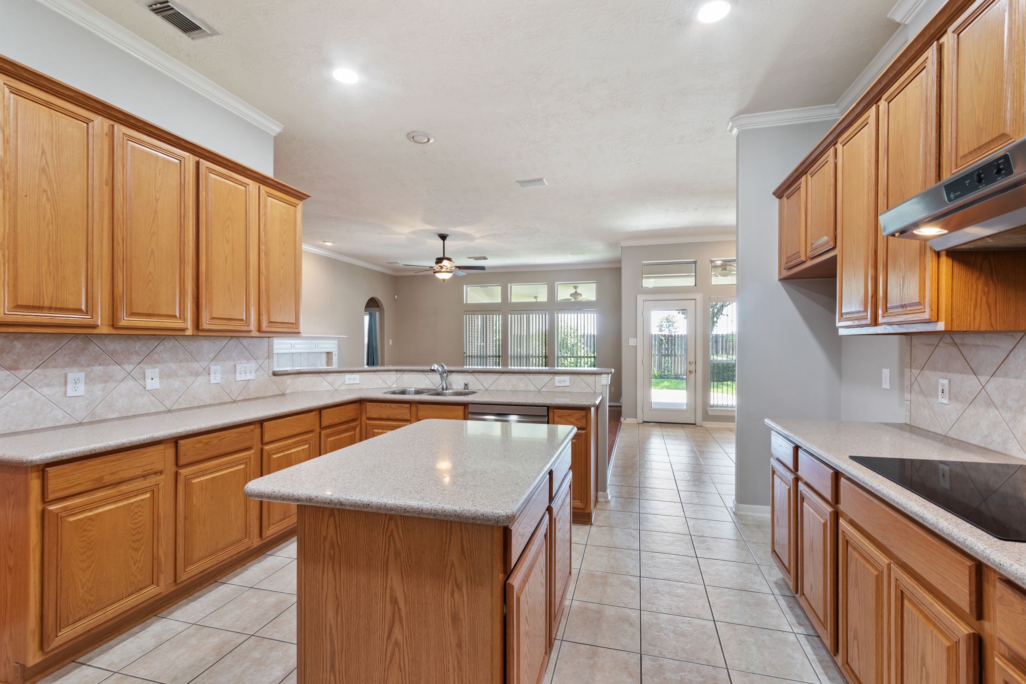 6311 Stone Trail Lane Spring, TX 77379 - Photo 15 of 47 Fantastic storage space in the 42" upper cabinets, along with drawers in every base cabinet to organize all your cookware