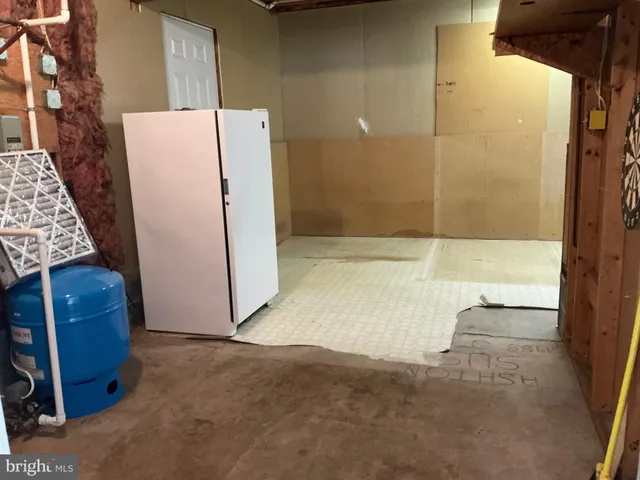 a bathroom with a tub and a shower