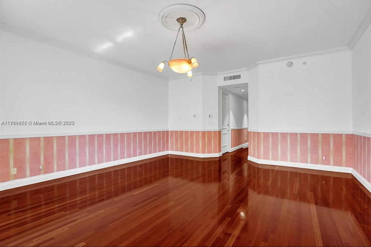 20165 Northeast 39th Place, Unit 403 Aventura, FL 33180 - Photo 14 of 40 a view of wooden floor and staircase