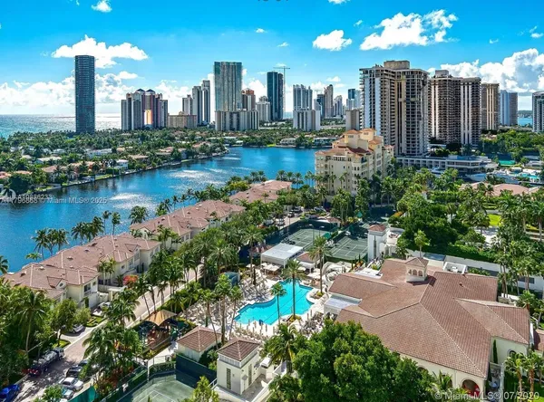 a view of a city with tall buildings