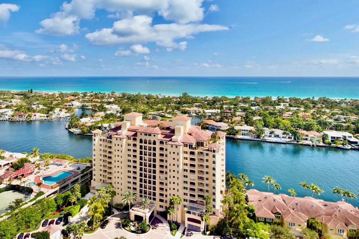 20165 Northeast 39th Place, Unit 403 Aventura, FL 33180 - Photo 39 of 40 a view of a city and ocean view