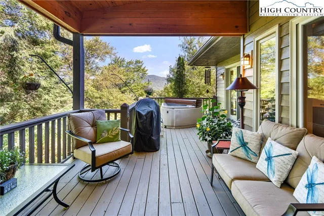 a view of a chairs on the roof deck