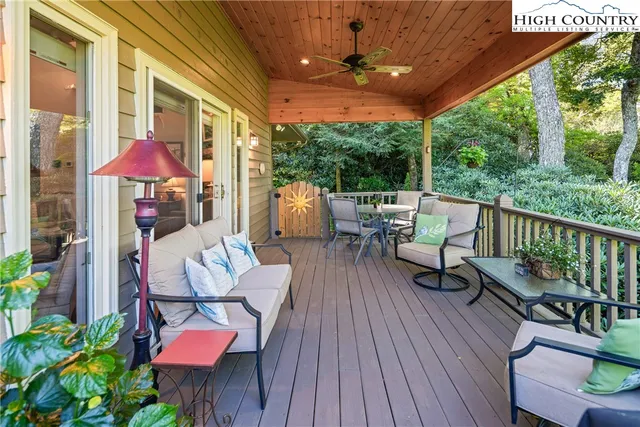 a view of a chairs on the roof deck