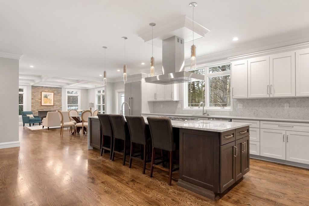 6 West Knoll Road Andover, MA 01810 - Photo 12 of 42 a large kitchen with lots of counter space and a sink
