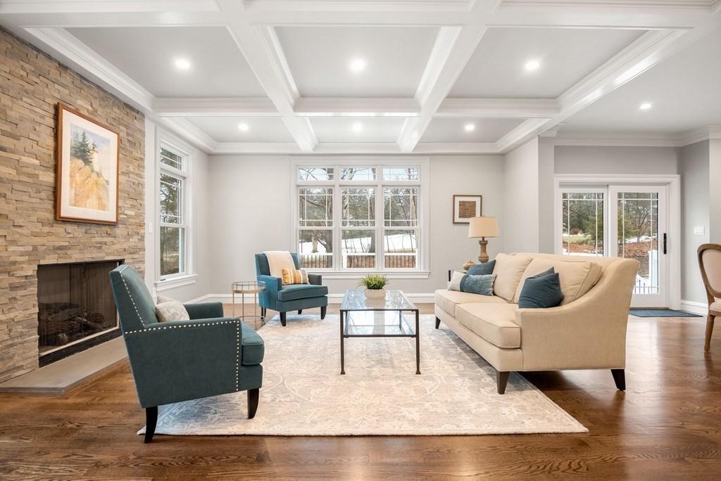 6 West Knoll Road Andover, MA 01810 - Photo 16 of 42 a living room with furniture wooden floor and a fireplace