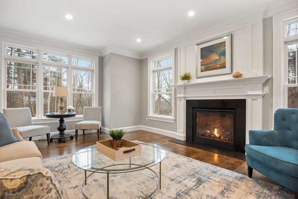 6 West Knoll Road Andover, MA 01810 - Photo 17 of 42 a living room with furniture and a fireplace