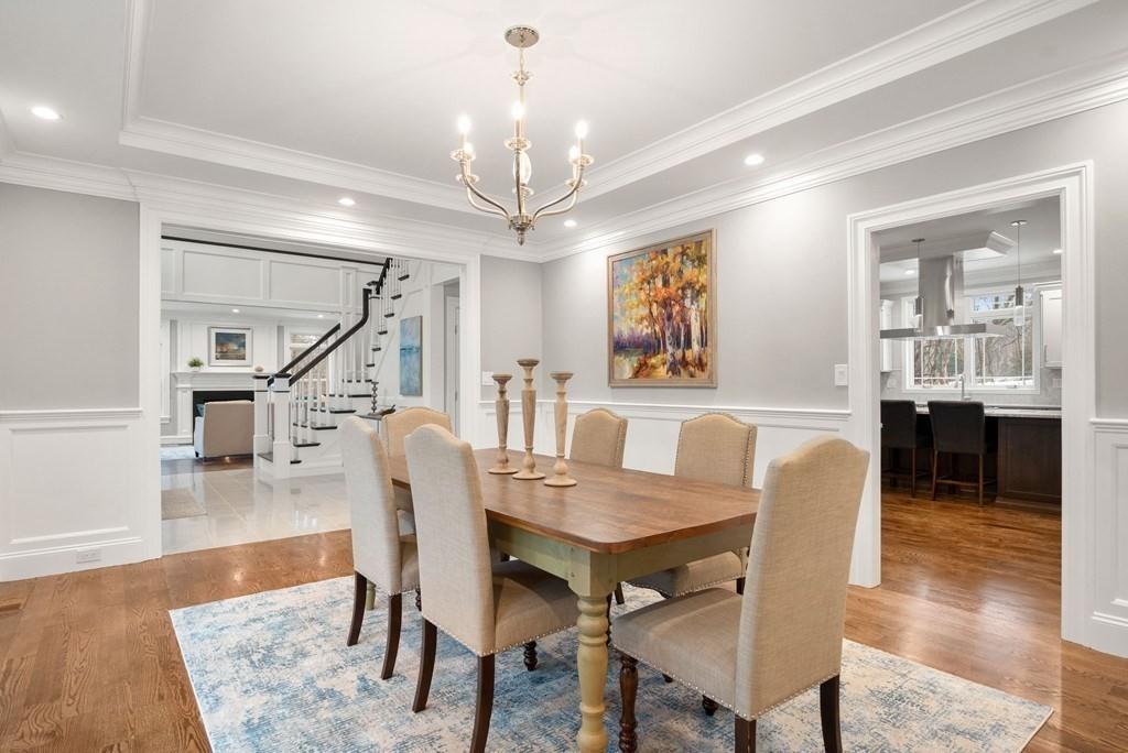 6 West Knoll Road Andover, MA 01810 - Photo 20 of 42 a view of a dining room with furniture and wooden floor