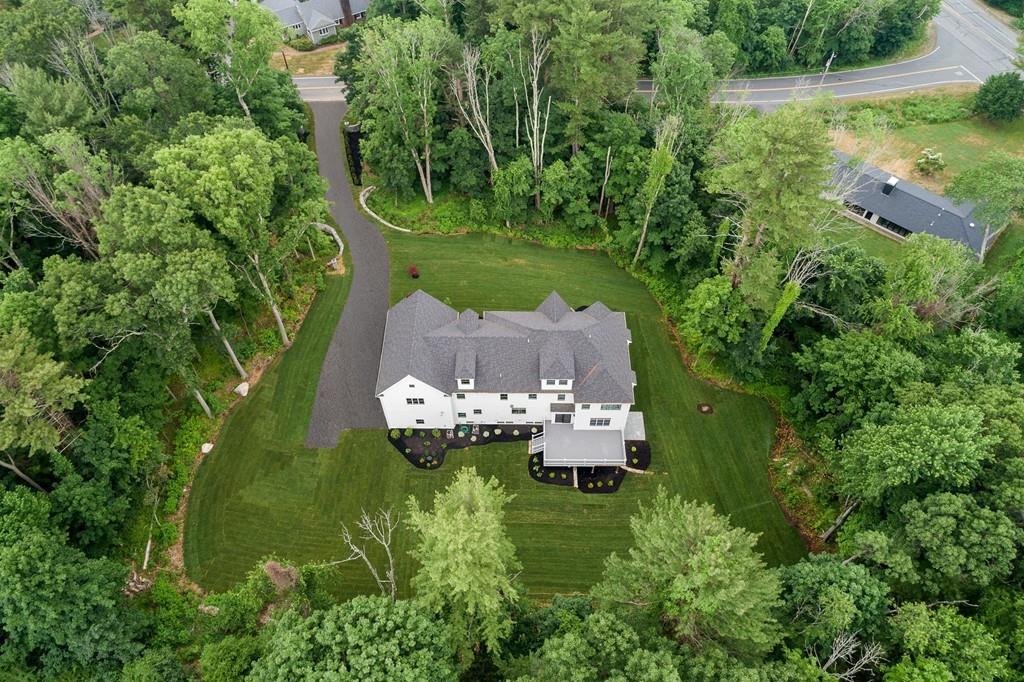 6 West Knoll Road Andover, MA 01810 - Photo 2 of 42 an aerial view of a house with a yard basket ball court and outdoor seating
