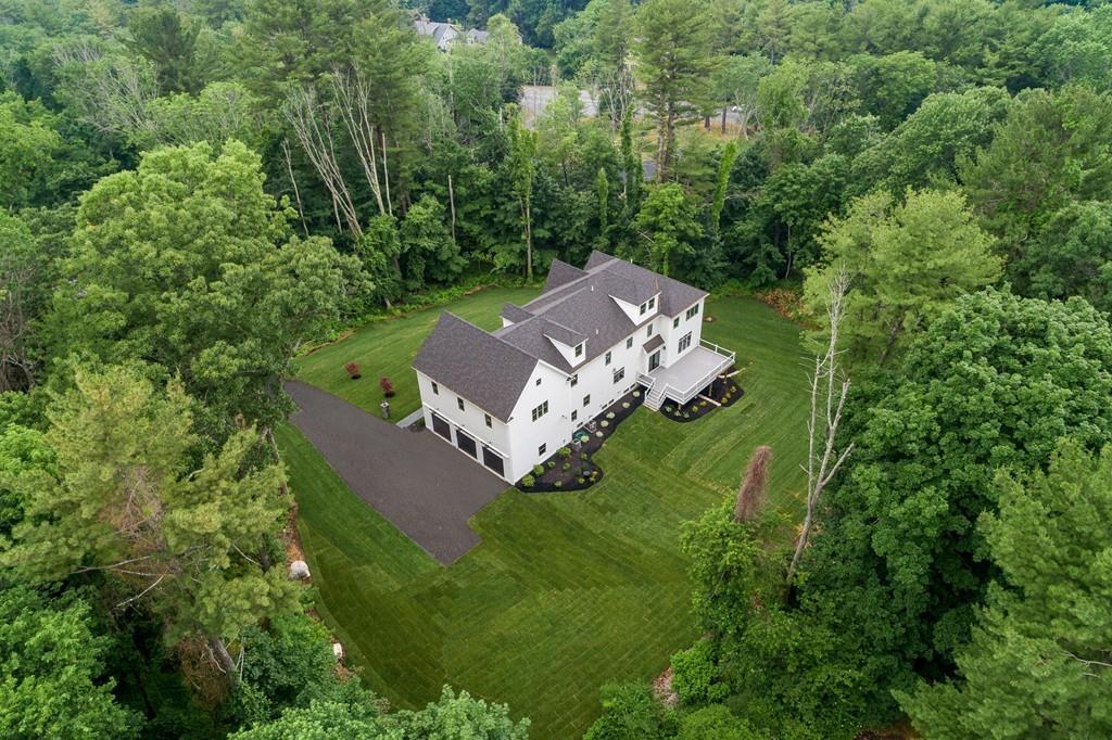 6 West Knoll Road Andover, MA 01810 - Photo 5 of 42 an aerial view of a house with a yard