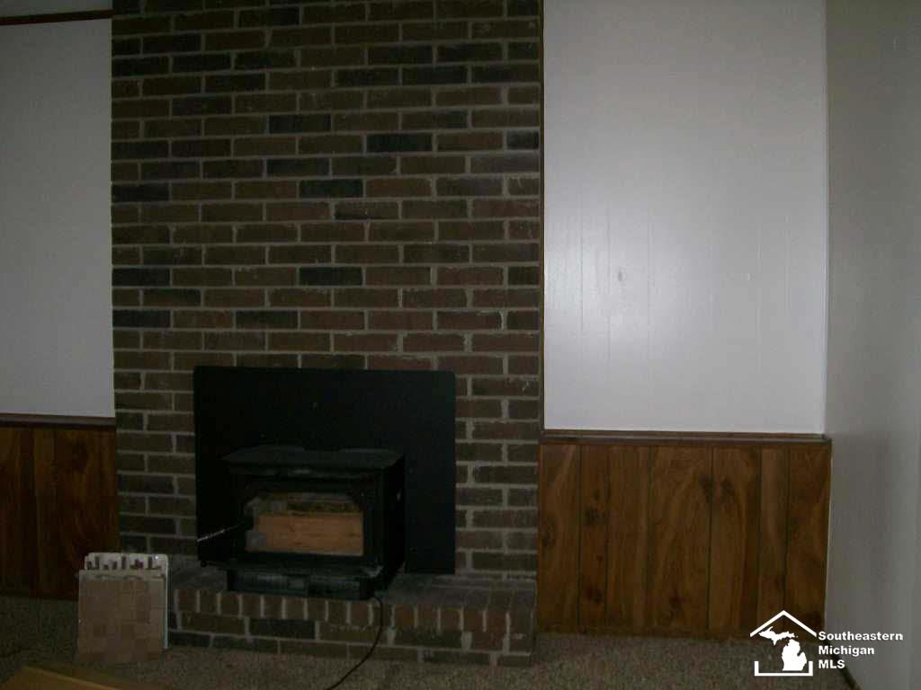 4222 Clegg Road Lambertville, MI 48144 - Photo 8 of 19 family rm wood burning