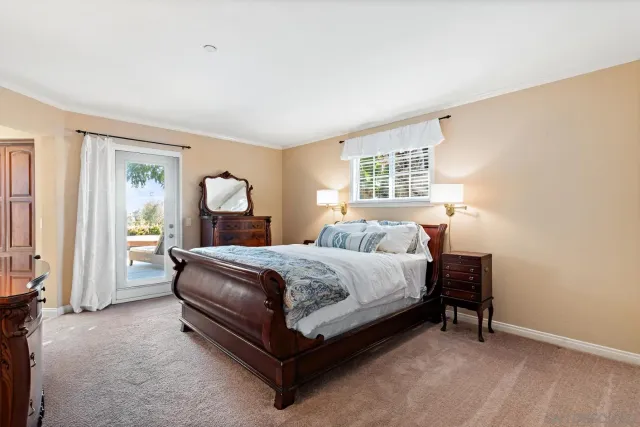 a view of a house with swimming pool and porch