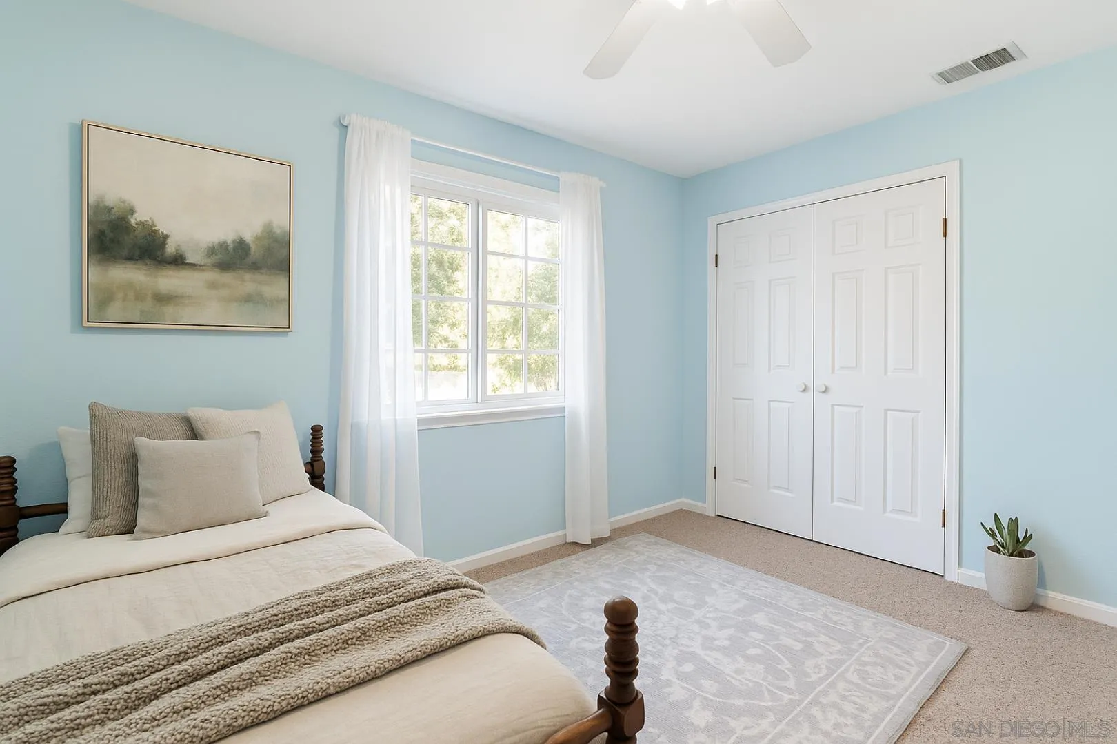 3121 Alta Verde Drive Fallbrook, CA 92028 - Photo 16 of 31 a bedroom with a bed and a window
