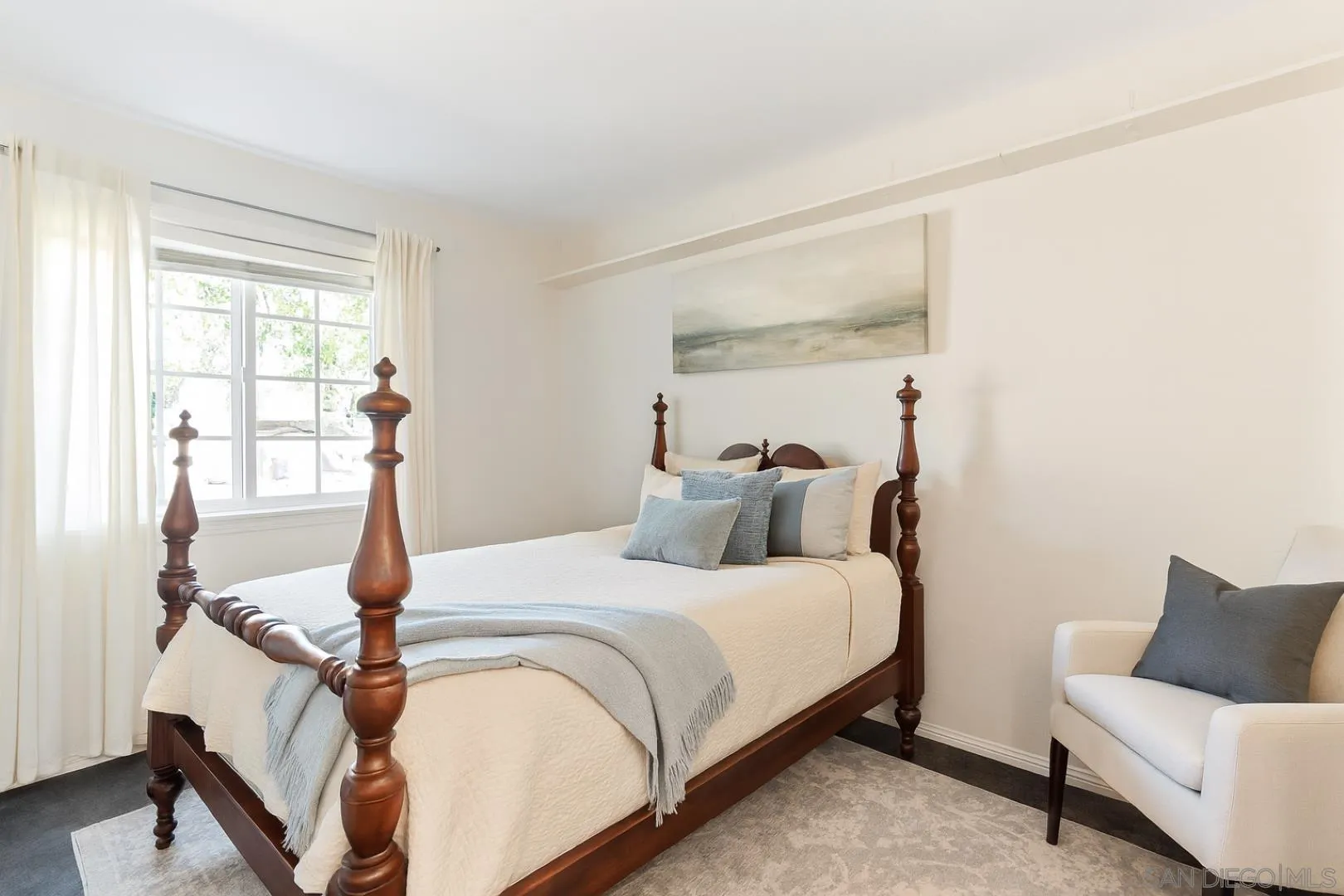 3121 Alta Verde Drive Fallbrook, CA 92028 - Photo 18 of 31 a bedroom with a bed and wooden floor