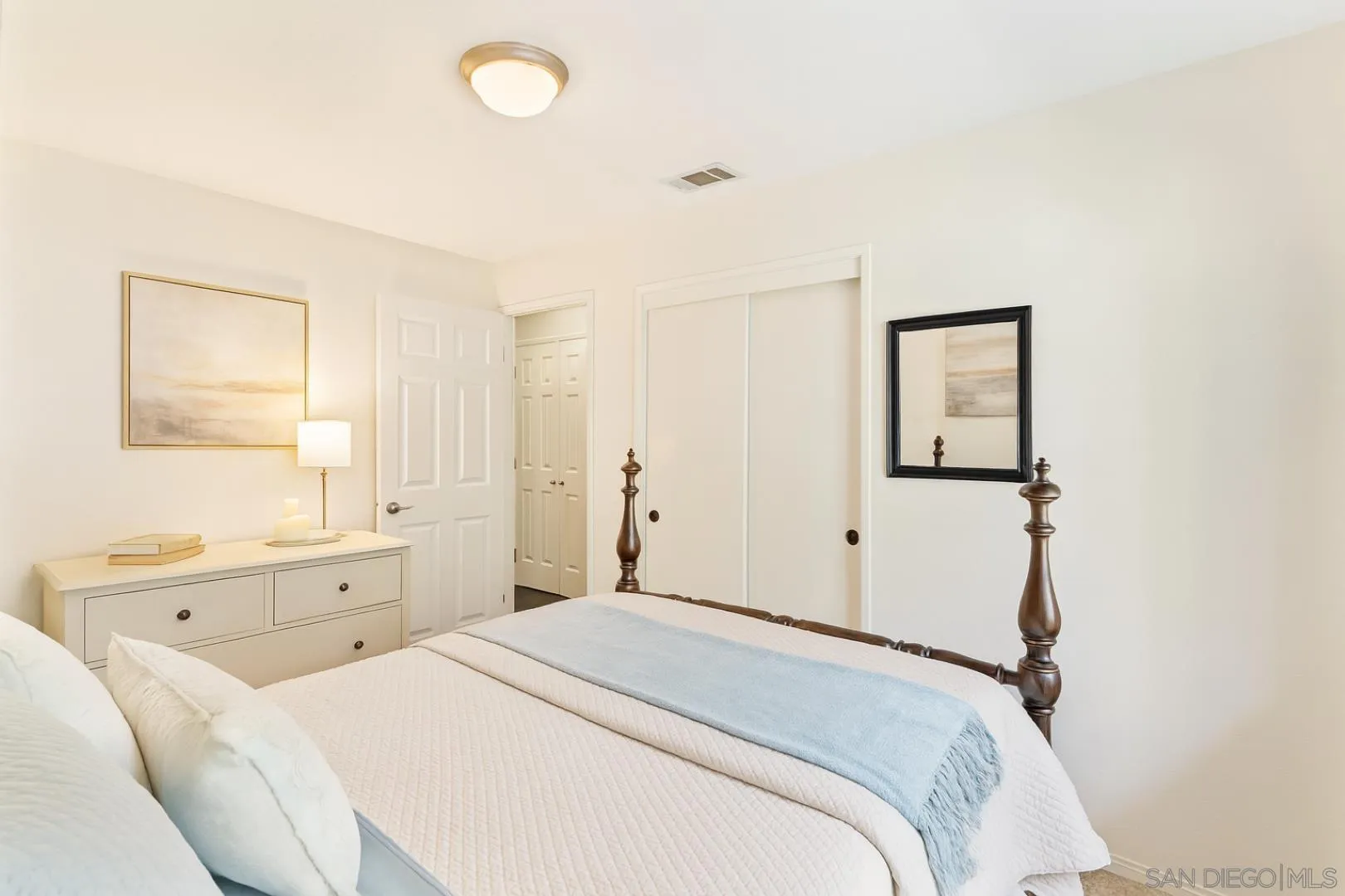 3121 Alta Verde Drive Fallbrook, CA 92028 - Photo 19 of 31 a bedroom with a bed and a window