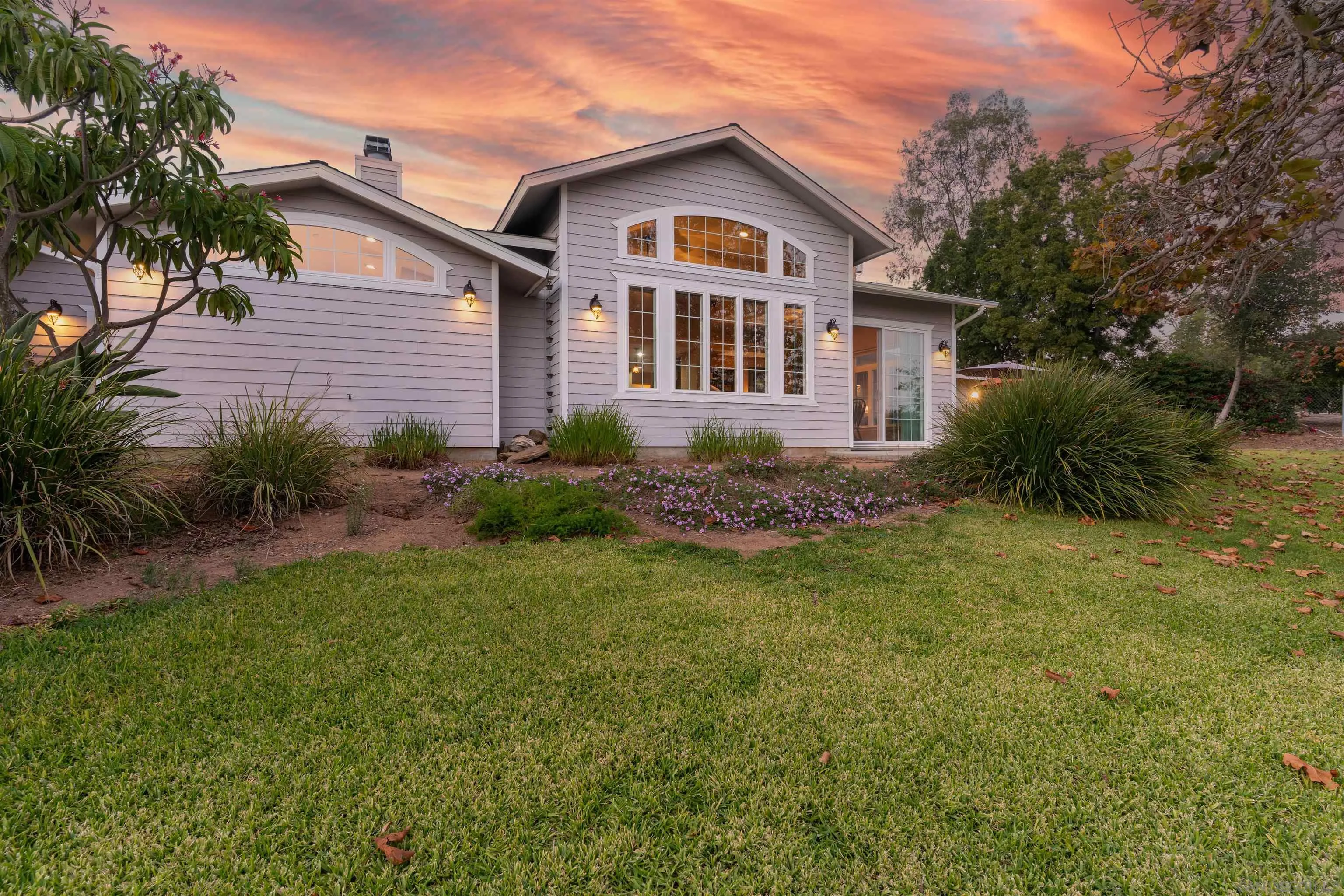 3121 Alta Verde Drive Fallbrook, CA 92028 - Photo 24 of 31 a front view of a house with garden