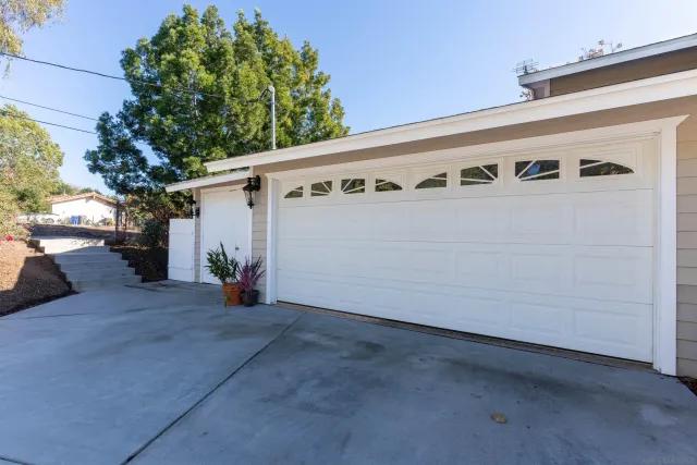 a view of a front of house with garage