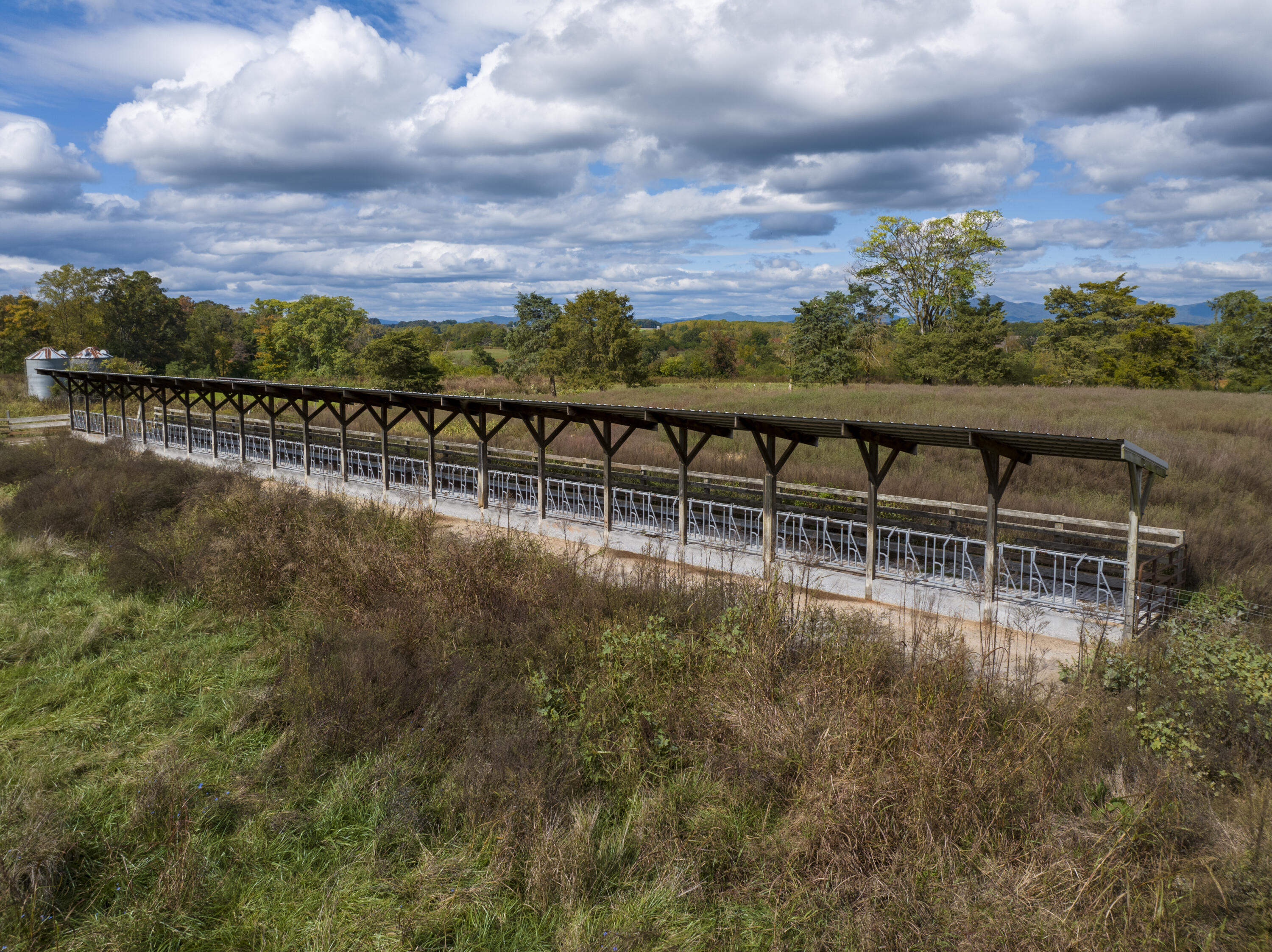 9961 Falling Creek Road Huddleston, VA 24104 - Photo 13 of 39 a view of a swimming pool with a lake view