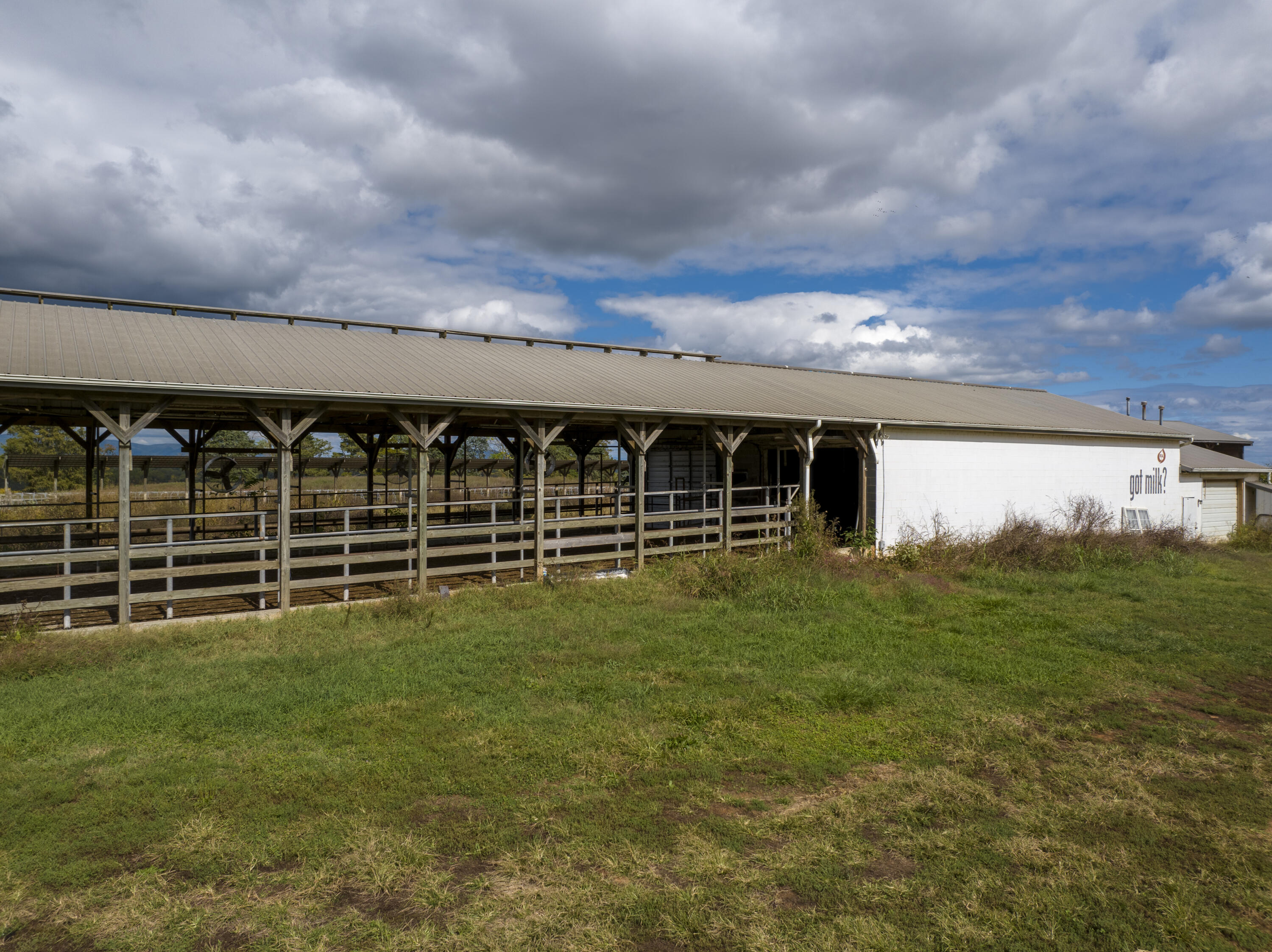 9961 Falling Creek Road Huddleston, VA 24104 - Photo 15 of 39 a view of a big yard with wooden fence