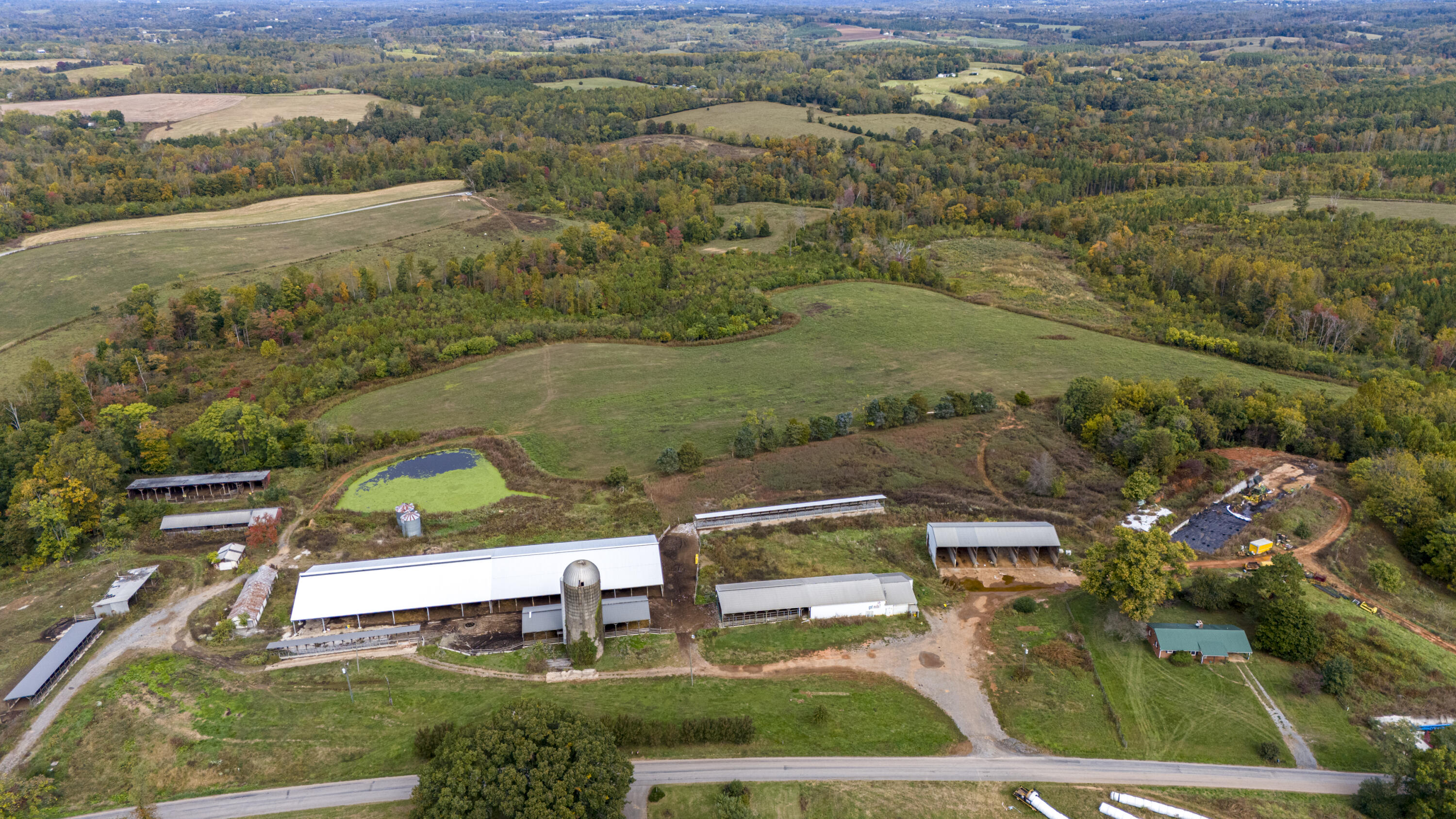 9961 Falling Creek Road Huddleston, VA 24104 - Photo 2 of 39 an aerial view of residential houses with outdoor space