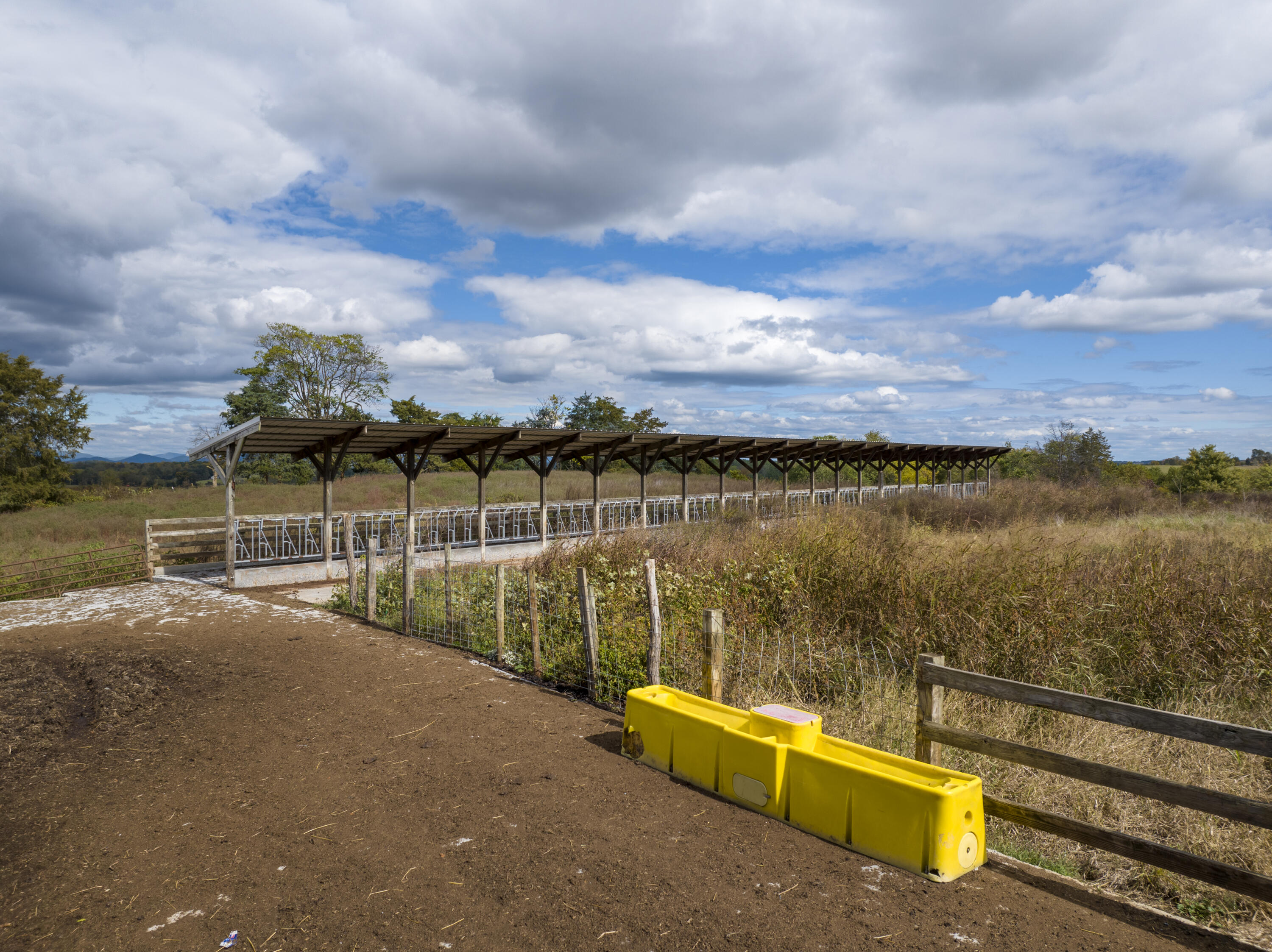 9961 Falling Creek Road Huddleston, VA 24104 - Photo 21 of 39 a view of a lake with a nearby beach